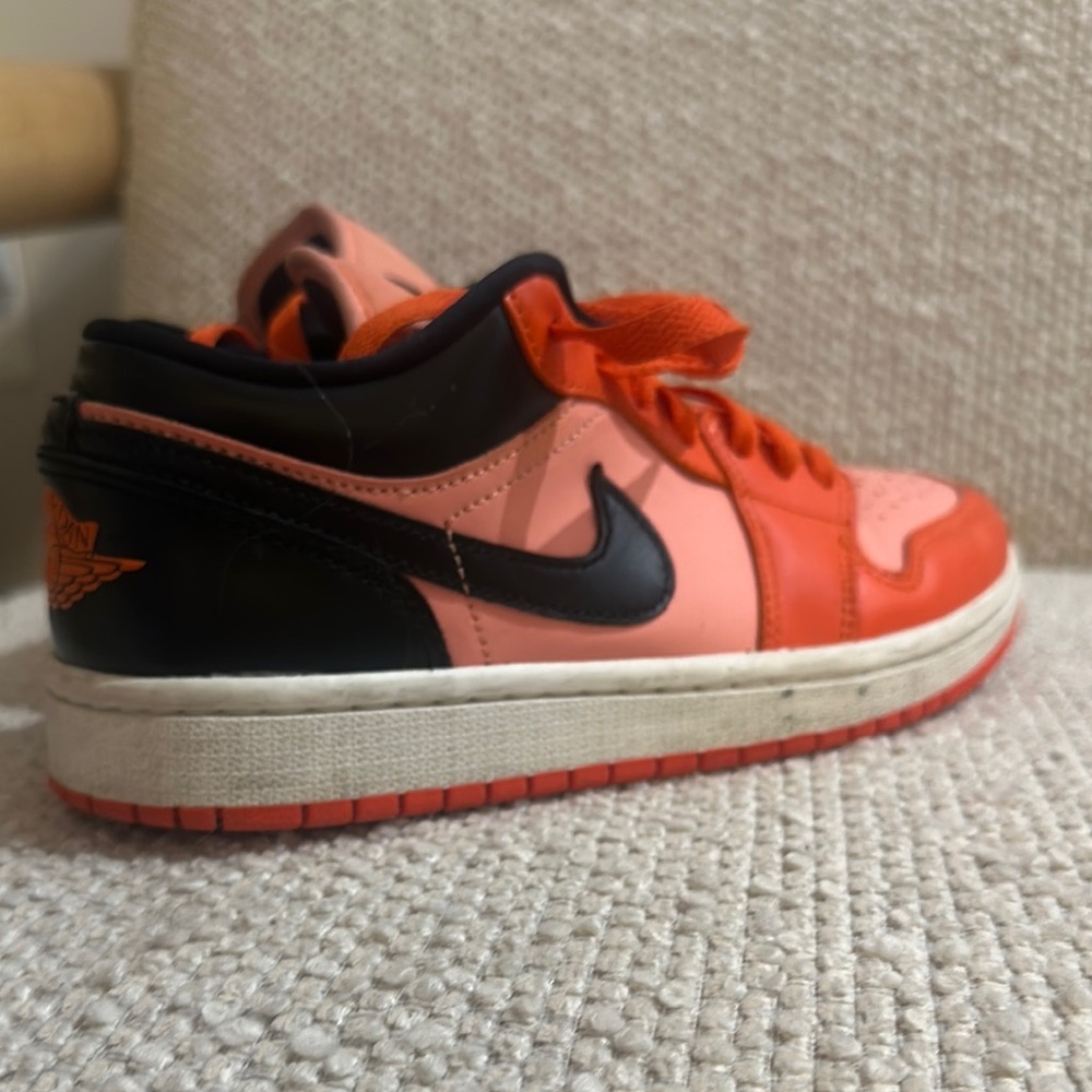 Nike Air Jordan 1 Low Coral and Black Sneakers